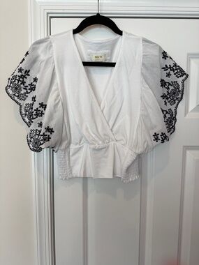 Maeve White Puff-Sleeve Wrap Top with Navy Floral Embroidery